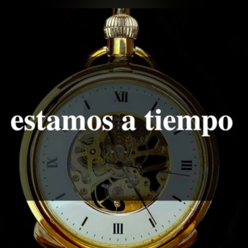 Reloj de bolsillo antiguo. Texto sobre la imagen" Estamos a tiempo